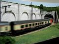 E656-069 avec un train express compos� de voitures Grand Confort, VSE et UIC type Z, le tout dans diff�rentes livr�es. Passage au Trou du diable